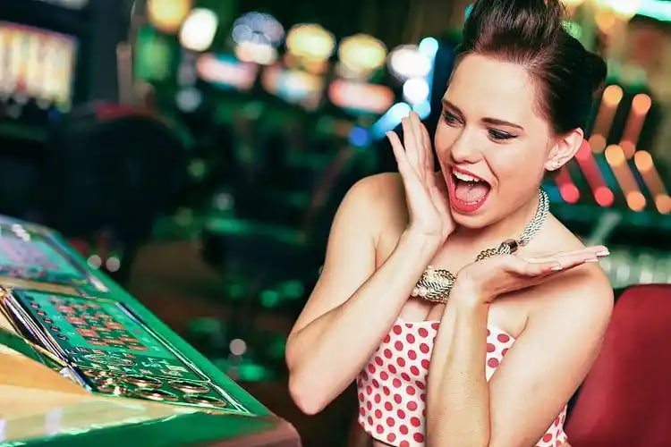 Sports betting and live casino options displayed on a mobile phone in the Philippines